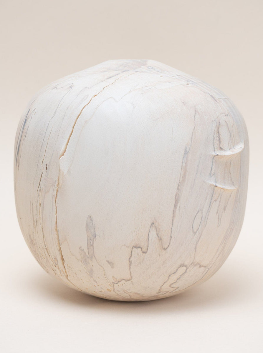 A Jume Spalted Wood Vase - Large on a minimalist white surface.