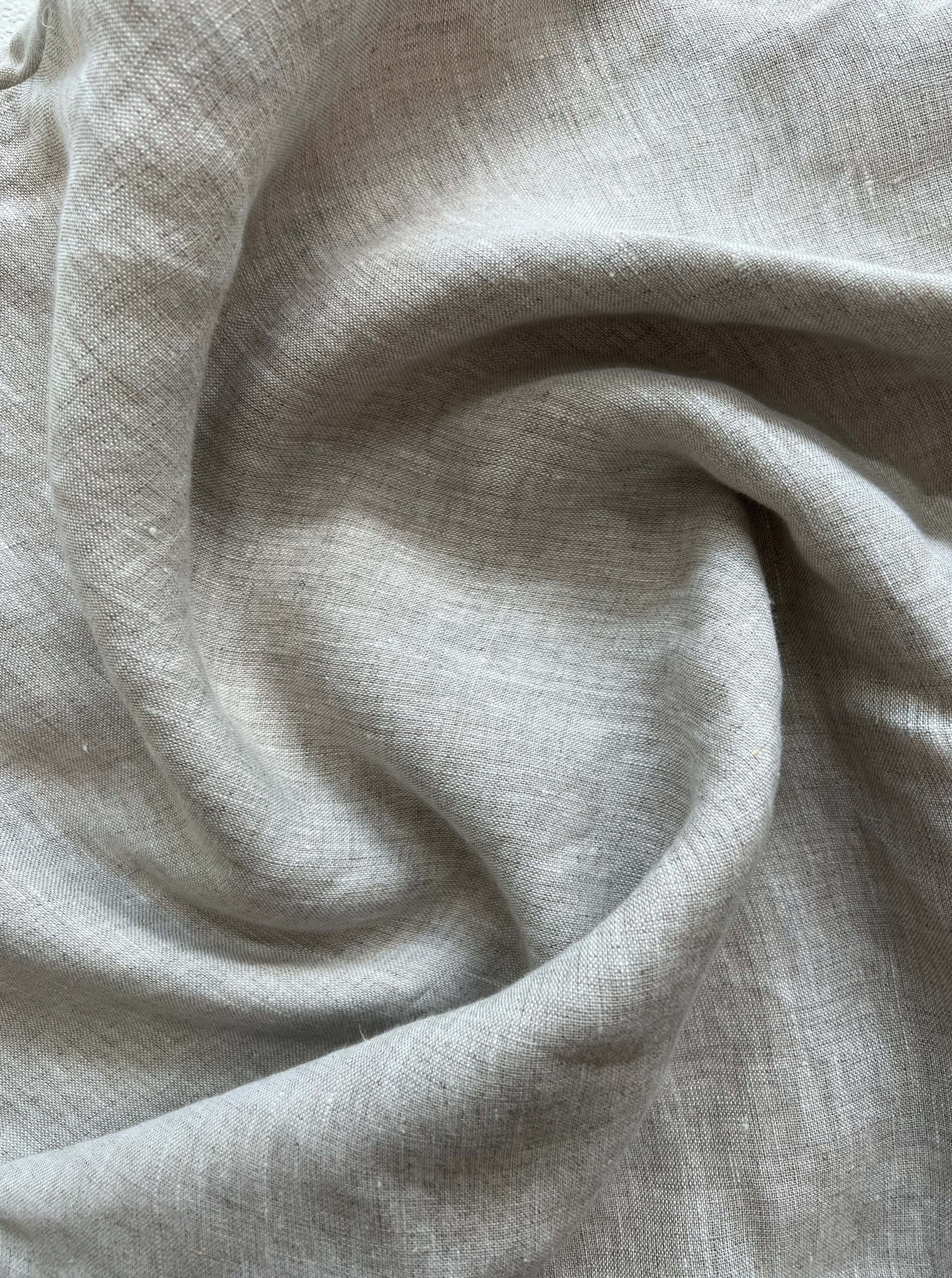 A close up image of an Everyday Top - Natural Linen fabric.